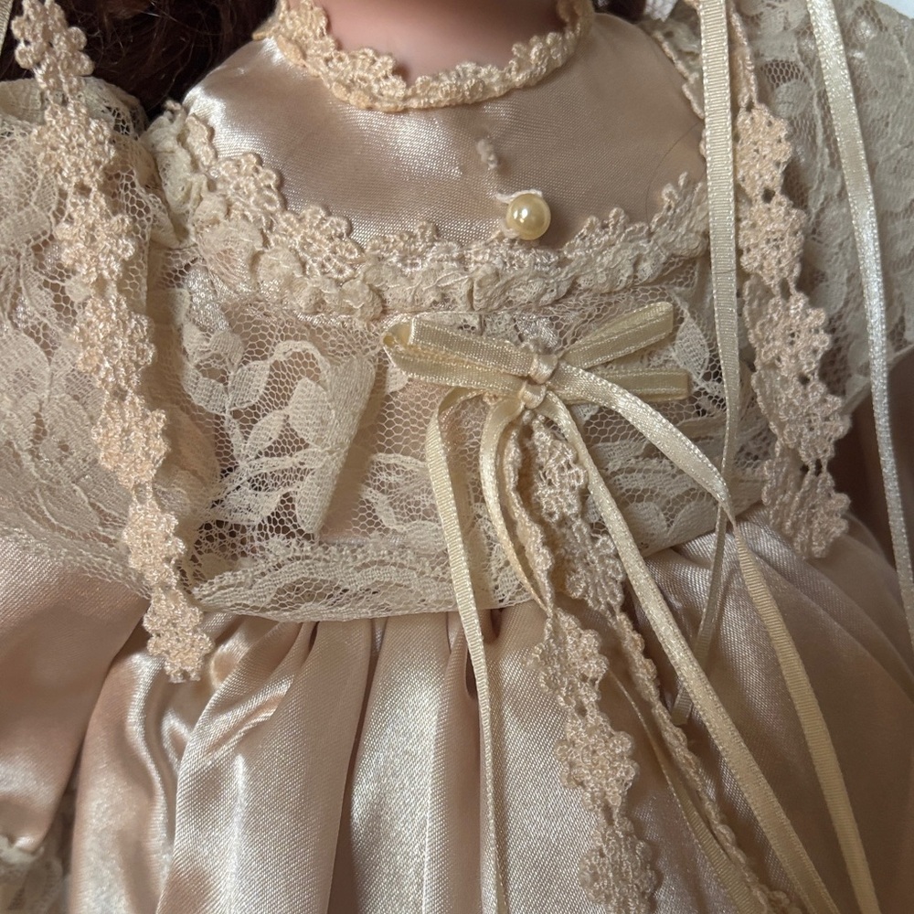 Charming Porcelain Cream Doll with Lace Accents - Picture 9 of 11